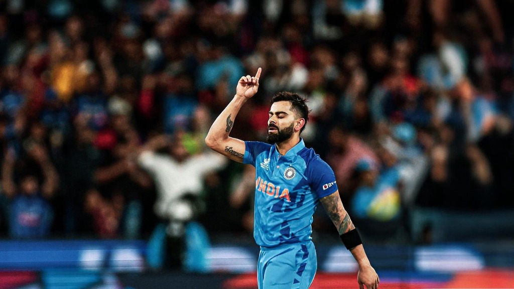 Virat Kohli celebrating with finger pointed to the sky
